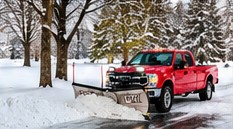 Illustrative red snowplow truck scene 3